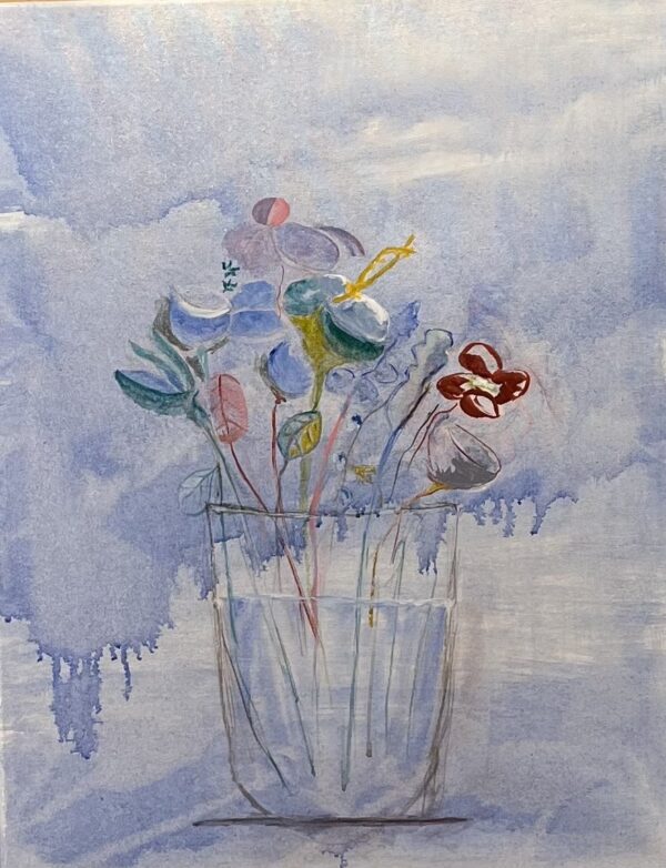 A vase of flowers on a blue grey background