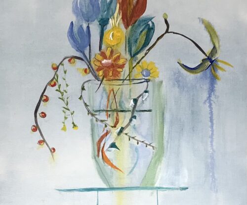 A vase filled with flowers on a blue background